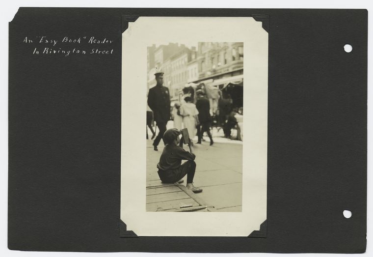 "An 'easy book' reader in Rivington Street", Manuscripts and Archives Division, The New York Public Library